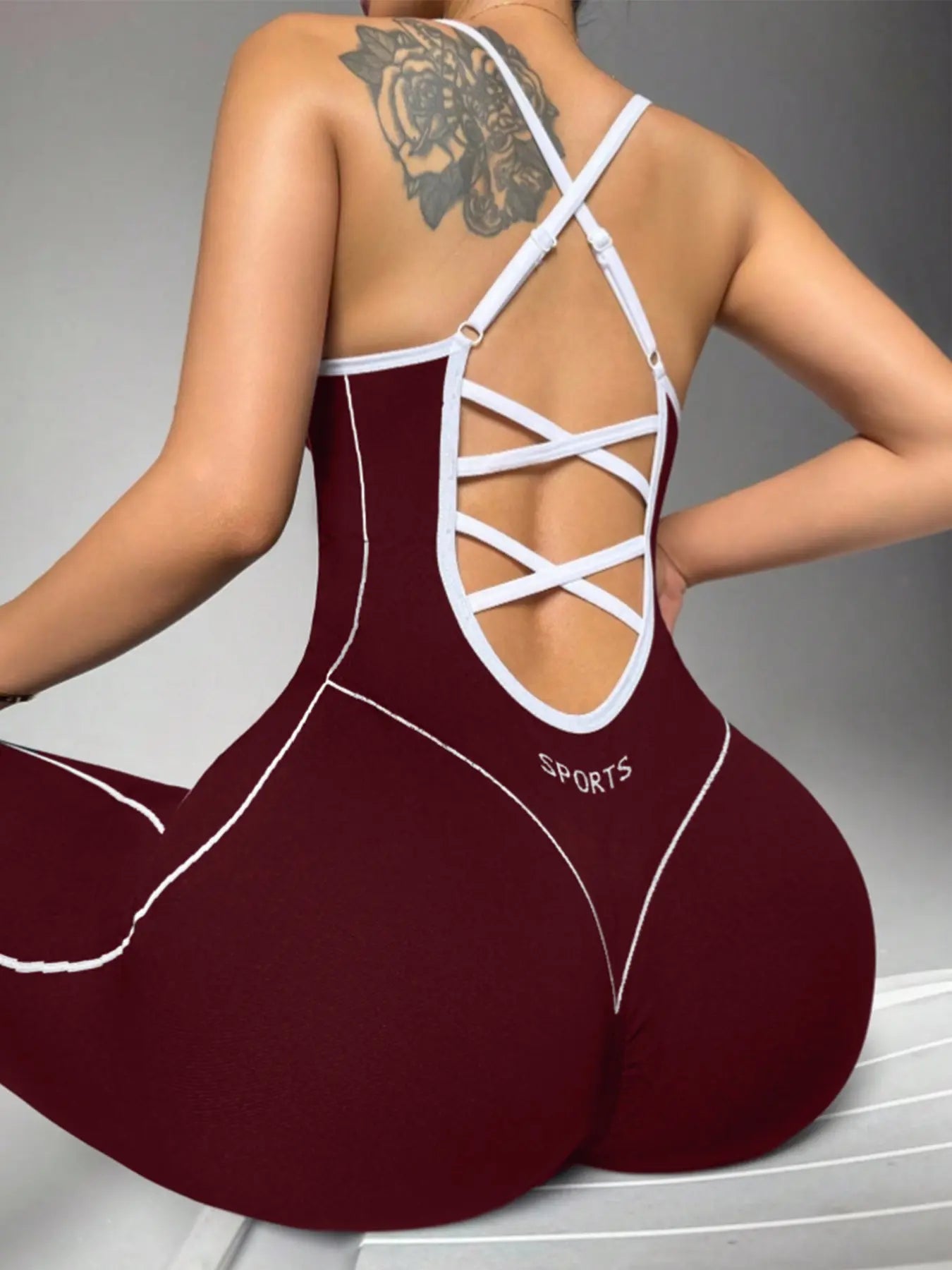 Women's Seamless High-Stretch Knit Halter Jumpsuit with Cross-Back Shoulder Straps, Perfect for Outdoor Cycling, Gym, Yoga, and Daily Wear